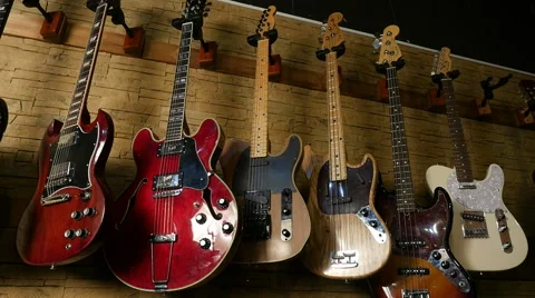 Panoramic shot of various electric guitars, Full HD 스톡 동영상 60695236