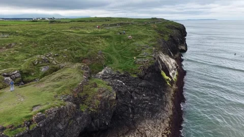 Panoramic side-angle drone view of steep coastal headlands, West Ireland. Stock Footage 342717401