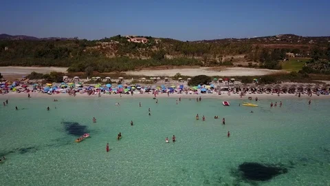 Panoramic side shots with a drone on the crowded beach of people Stock Footage 98992914