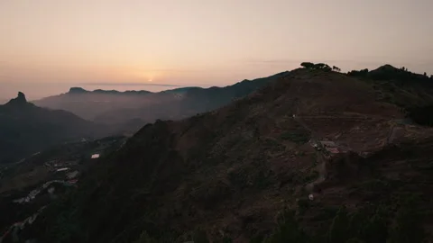 Panoramic silhouettes of misty mountains in evening light at sunset Stock Footage 342837947