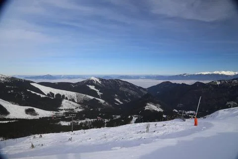 Panoramic Ski Slope View Above Sea of Clouds and Peaks Fotos Stock