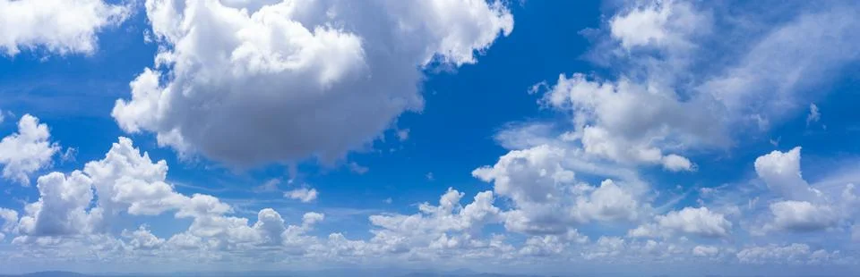 Panoramic sksky cloud background. Panoramic sky on a sunny day. light blue .. Stock Photos
