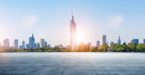 Panoramic sky and building with empty concrete square floor Stock Photos