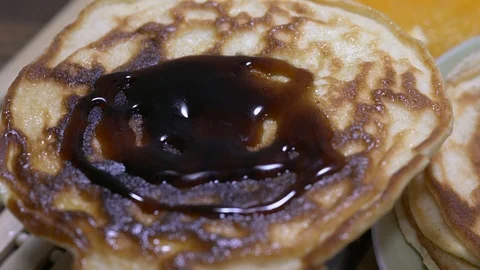 Panoramic slide over rotating pancake with smile Vídeos de archivo 88042158