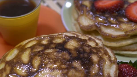 Panoramic slide over a table with coffee and pancakes Stock-Footage 88042044