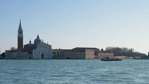 Panoramic slow motion shot of san giorgio church building in Venice, Italy on a Stock-Footage 131944339