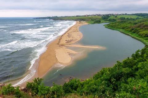 Panoramic spring view with beautiful wild beach Stock Photos