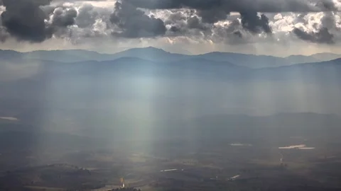 Panoramic sun rays breaking through mixed clouds - Lowlands While and Sky Rays Stock Footage 339556467