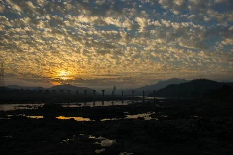 Panoramic sunrise captured with beautiful clouds in Narmada, Gujarat, India Stock Photos