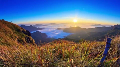 Panoramic Sunrise Over Mountainous Landscape with Sea of Clouds Video stock 310217153