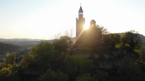 Panoramic Sunset Drone Shot Around The Church Of Tsarevets, Veliko Tarnovo Video stock 129027437