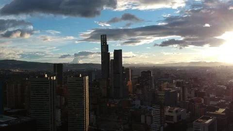 Panoramic of a sunset with a skyscraper in dowtown	 Stock Footage 157691020