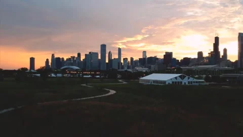 Panoramic Sunset View of Chicago Skyline and Northerly Island Park Stock Footage 346889388