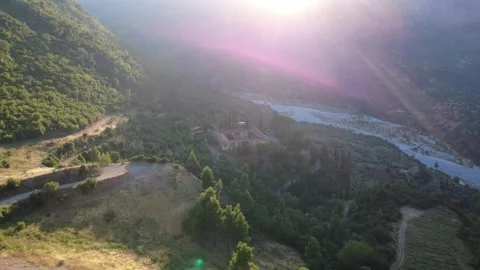 Panoramic sunset view of a Christian monastery in a forest canyon Stock Footage 343962657