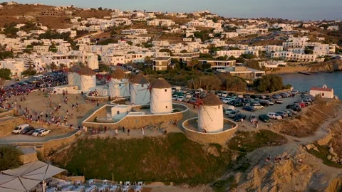 Panoramic sunset view of the famous Windmills above Mykonos town Stock Footage 188998331
