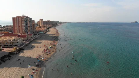 Panoramic sunset view to long sandy beach of La Manga de mar menor Vidéo 95141158