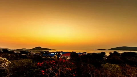 Panoramic Sunset View over Coastal Village and Islands Video stock 310243577