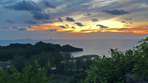 Panoramic Sunset View Over Coastal Islands and Lush Foliage Stock Footage 310377361