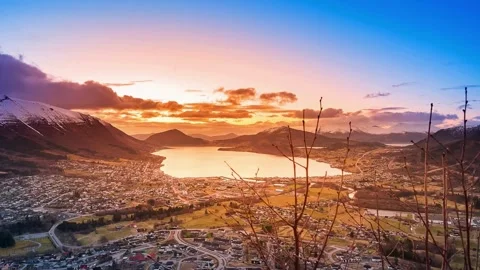 Panoramic Sunset View Over Lake and Mountain Range Stock Footage 310243707