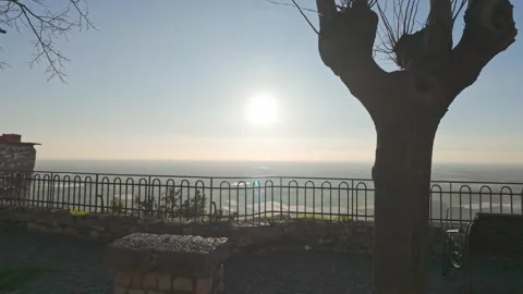 Panoramic sunset view from Sermoneta. Wide views of agricultural fields. Video stock 290116107