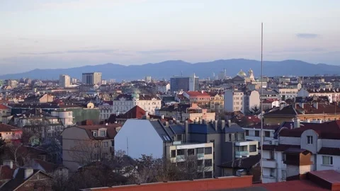 Panoramic sunset view of Sofia, Bulgaria with mountains in the background Stock Footage 304438316
