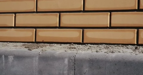 Panoramic survey on construction site, foundation and freshly built brick wall Stock Footage 130367842