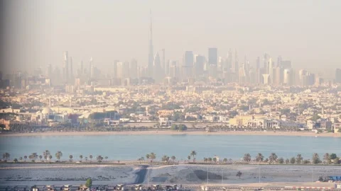 Panoramic tilt up window view to high buildings with balconies and marina i.. Stock-Footage 242453968