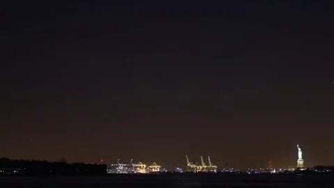 Panoramic Time-lapse of the Crescent Moon Setting over the Statue of Liberty Stock Footage 84903783