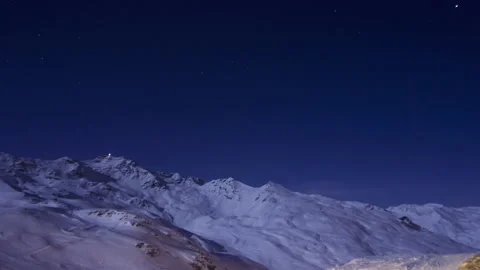 Panoramic timelapse of snowcat driving mountains at night in winter Stock Footage 155393786