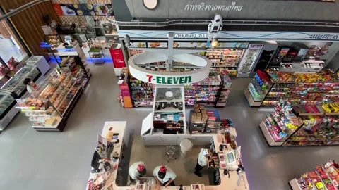 Panoramic top view of a 7 Eleven shop, Pattaya city, Thailand 4K Stock Footage 242074979