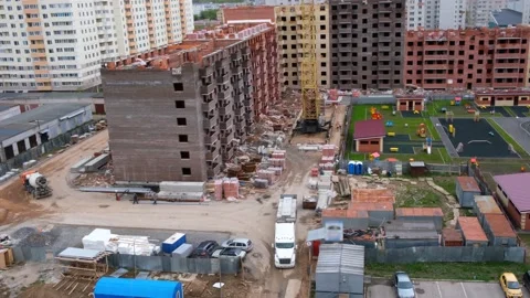 Panoramic top view of building under construction and cranes Stock Footage 143994587