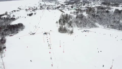 Panoramic top view from drone on cable way in ski resort. Ski lift elevator Stock Footage 162463881