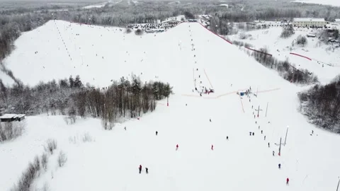 Panoramic top view from drone on cable way in ski resort. Ski lift elevator Vídeo Stock 162463981