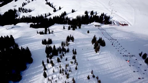 Panoramic top view from drone on cable way in ski resort. Ski lift elevator t Stock Footage 164557984