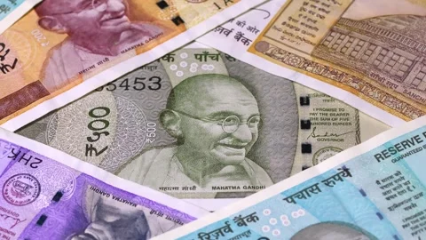 Panoramic top view of Indian 50, 100, 200 and 500 rupee notes. Stock Footage 304284761