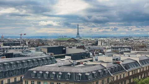 Panoramic top view of Paris, rooftops, Eiffel Tower and cloudy sky. Stock Footage 311939560