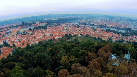 Panoramic Top view to red tile roofs of Prague city Czech republic. Typical Stock Footage 81677531