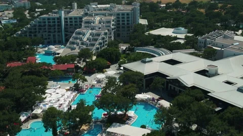 Panoramic top view. Rest, relaxation, pool. Carefree time. Video stock 158143979