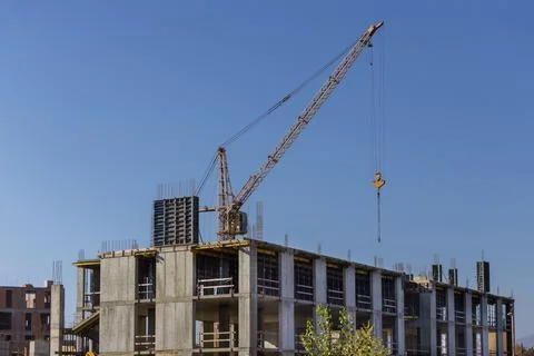 Panoramic top view several construction tower cranes of different heights at  Stock Photos