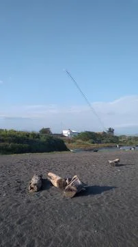 Panoramic of the tranquil Samas beach Stock Photos
