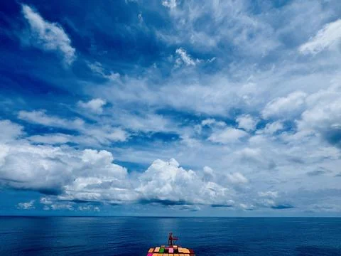 Panoramic Tropical Ocean with Dramatic Clouds Seen from Container Ship Stock Photos