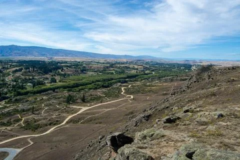 Panoramic Valley View with Winding Roads Stock Photos