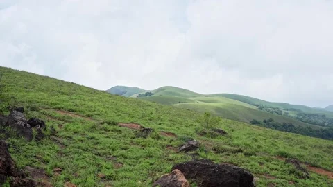 A panoramic video of beautiful mountains surrounded by lush, dense forest d.. Stock Footage 313381113