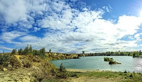 Panoramic view of an abandoned marble quarry Stock Photos