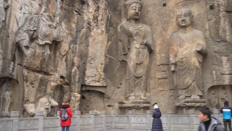 Panoramic view about the Longmen Giant Buddha's Cave from left to right Stock Footage 125338620