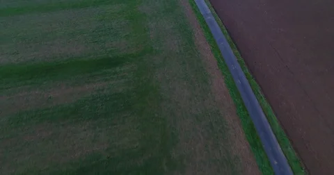 Panoramic View From Above On Meadows  and Countryside road Stock Footage 83085776