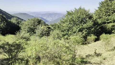 Panoramic view from above on a mountain valley 库存影片 345034298