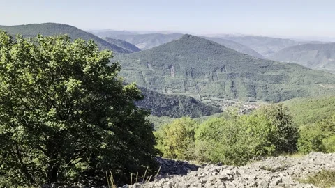 Panoramic view from above on a mountain valley 스톡 동영상 345034541