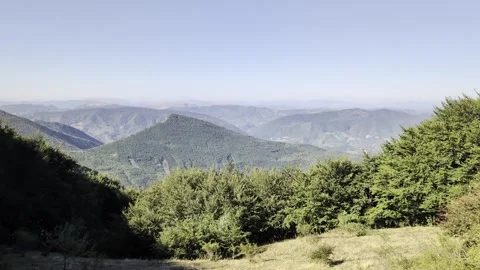 Panoramic view from above on a mountain valley 스톡 동영상 345035277