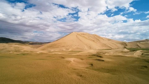 Panoramic view from above on a sandy desert with lakes. Stock Footage 93870594